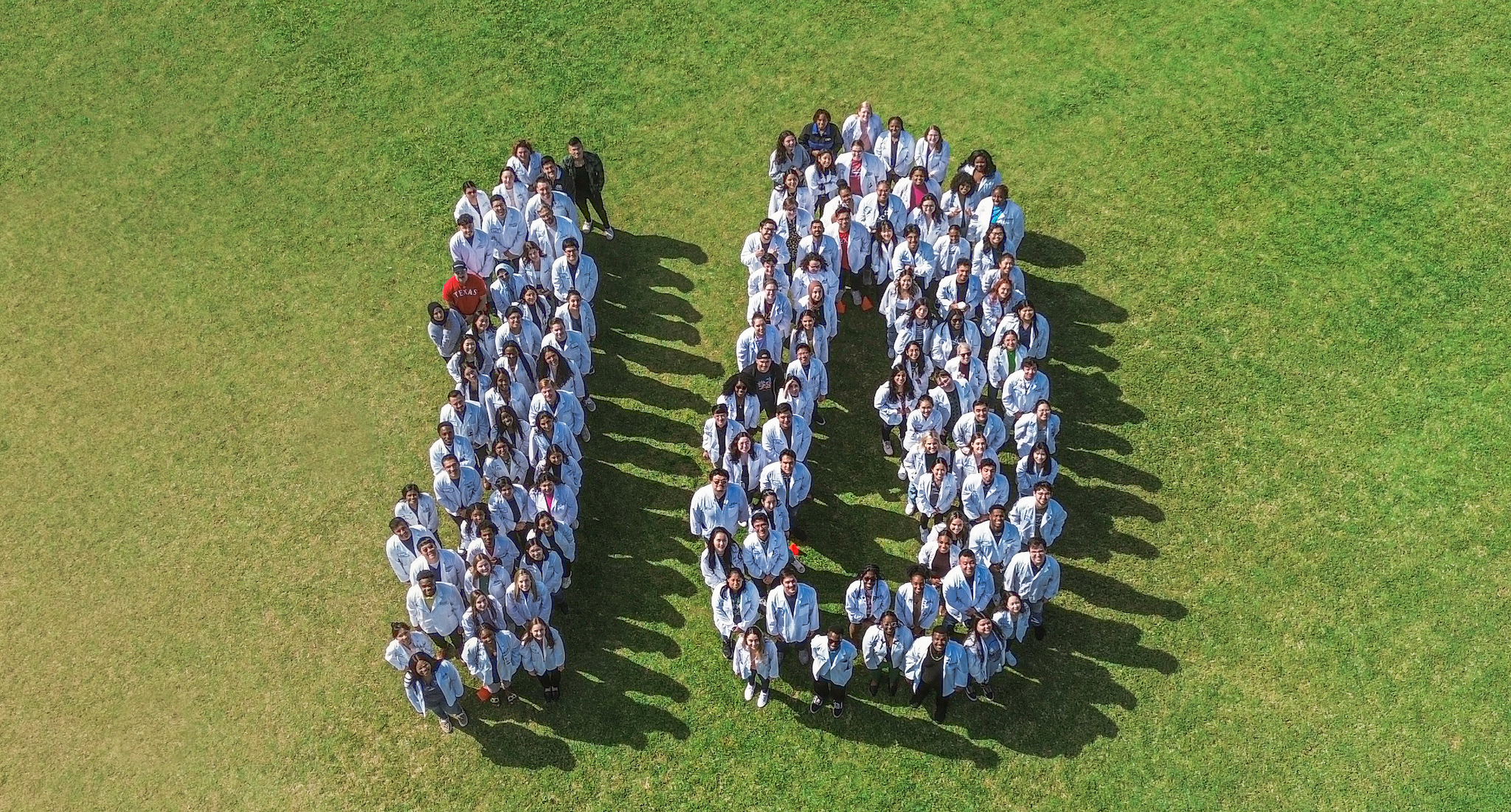 Photo of students in formation of the number ten for the College of Pharmacy 10th Anniversary