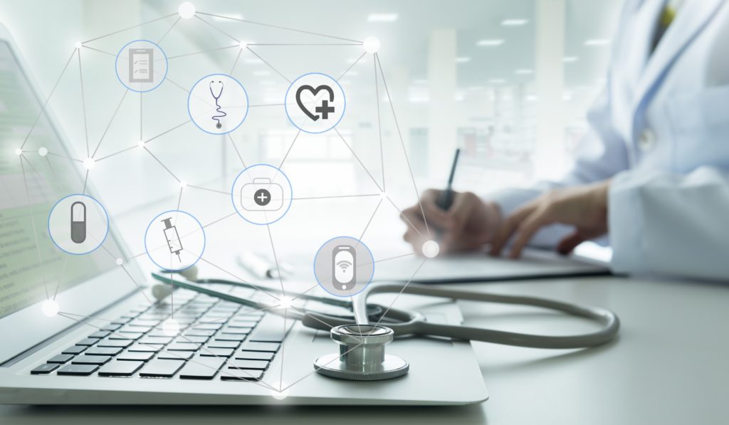 Healthcare,technology,concept.,doctor,using,a,laptop,computer,contact,with