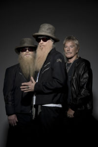 photo of the 3 members of zz-top in leather jackets