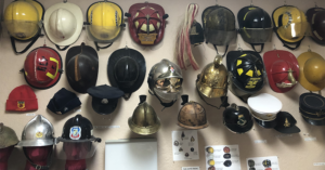 Dr. Christopher Hull, TCOM alum, has an entire wall of hats to brighten his patients days.
