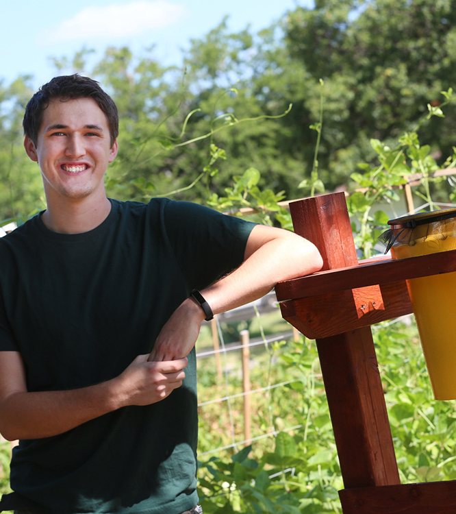 Jacob Fripp with Drip Irrigation bucket