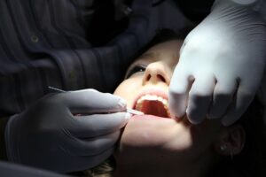 Teeth being treated b an oral hygeneist. Photo courtesy of the IPTC. 