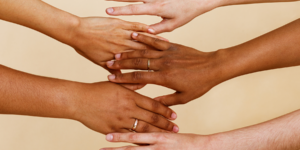 Image with hands in different skin tones