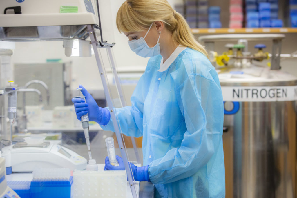 student working with bone dna