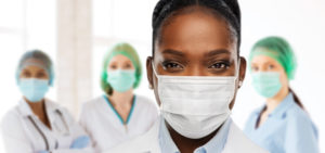 close up of health professional with mask