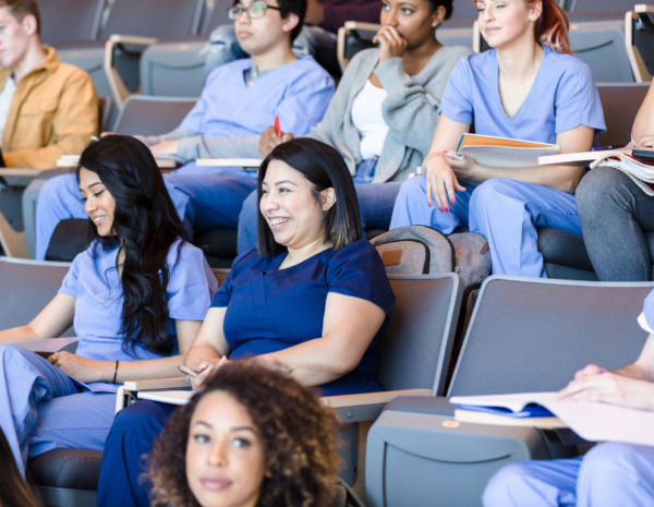 a group of health professions' students sitting in a lecture hall