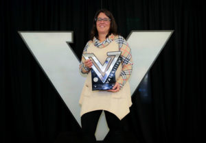 Lisa Nash accepting the 2019 Valubility of the Year trophy