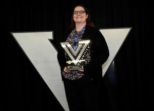 Leslie Henderson accepting the 2019 Valubility of the Year trophy